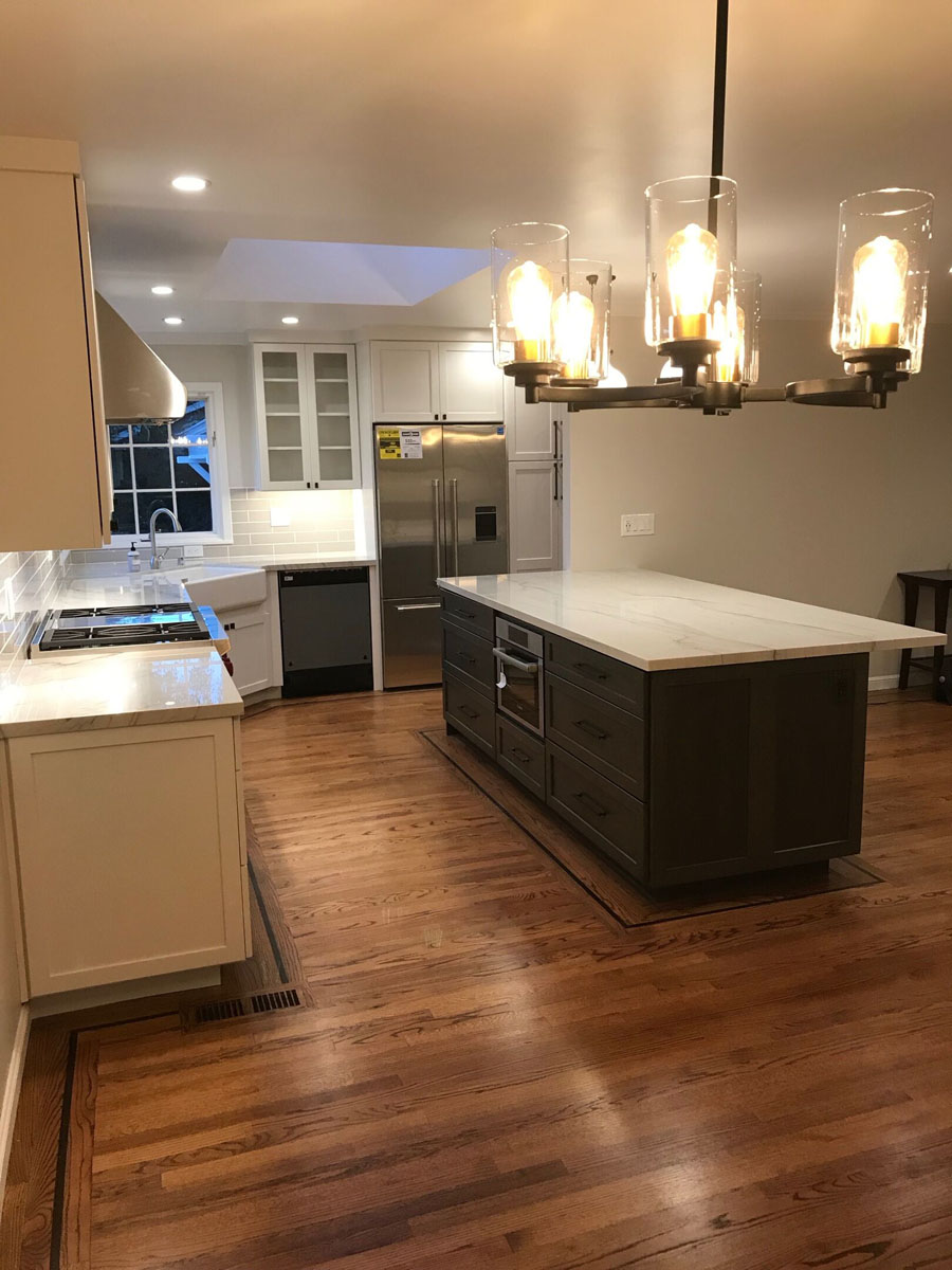 dark island, white cabinets, built-in microwave - kitchen remodel in Bay Area