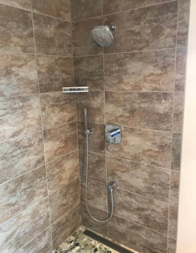 brown tile in modern shower