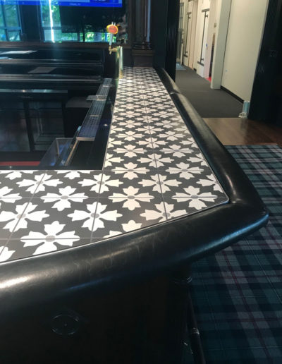 Beautiful black and white tiled bar, custom made