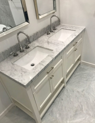 dual sink grey and white, cream cabinets