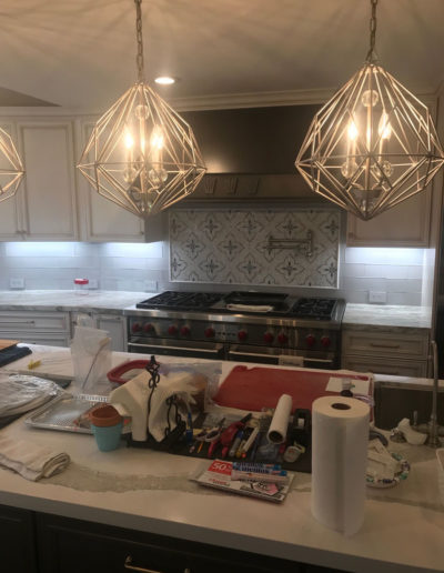 pendant kitchen lighting with unique backsplash