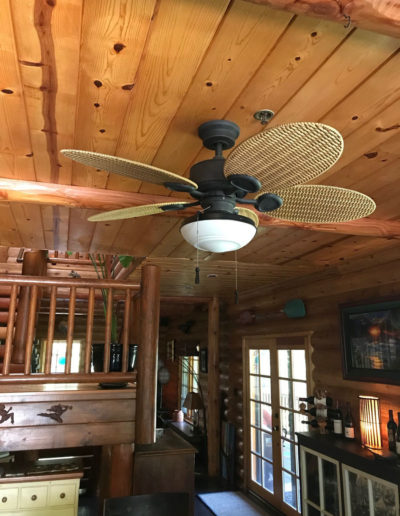 fan in log cabin kitchen