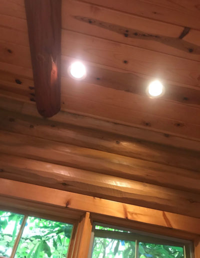lighting inside log cabin kitchen remodel